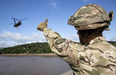 Armed Forces Solider and Helicopter