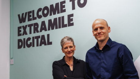 Staffordshire Marketing Agency in front of a wall graphic