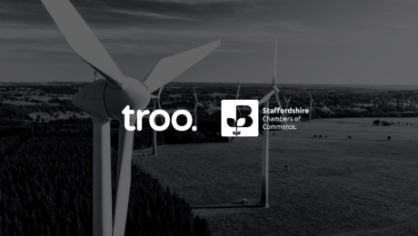 Troo Logo with Staffordshire Chambers in front of a windmill in a field