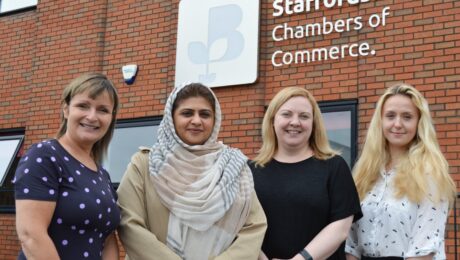 With a supported refugee, Positive Pathways Programme is pictured in front of Staffordshire Chambers of Commerce.