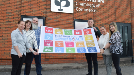 Staffordshire Chambers team pictured outside of their offices with the Sustainable Development Goals flag