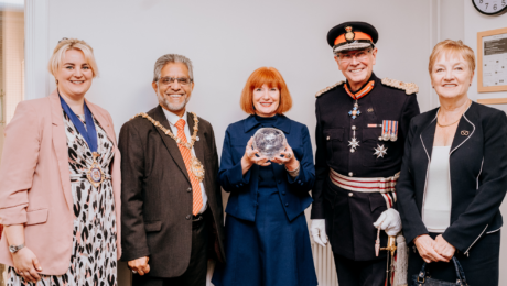 Sara Williams, Chief Executive Officer of Staffordshire Chambers with Ian Dudson, Lord-Lieutenant for Staffordshire presenting a King's Award to Sara
