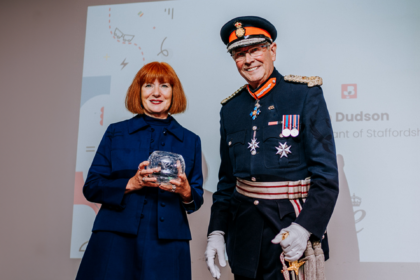 Sara Williams, being presented the King's Award by Ian Dudson, Lord Lieutenant
