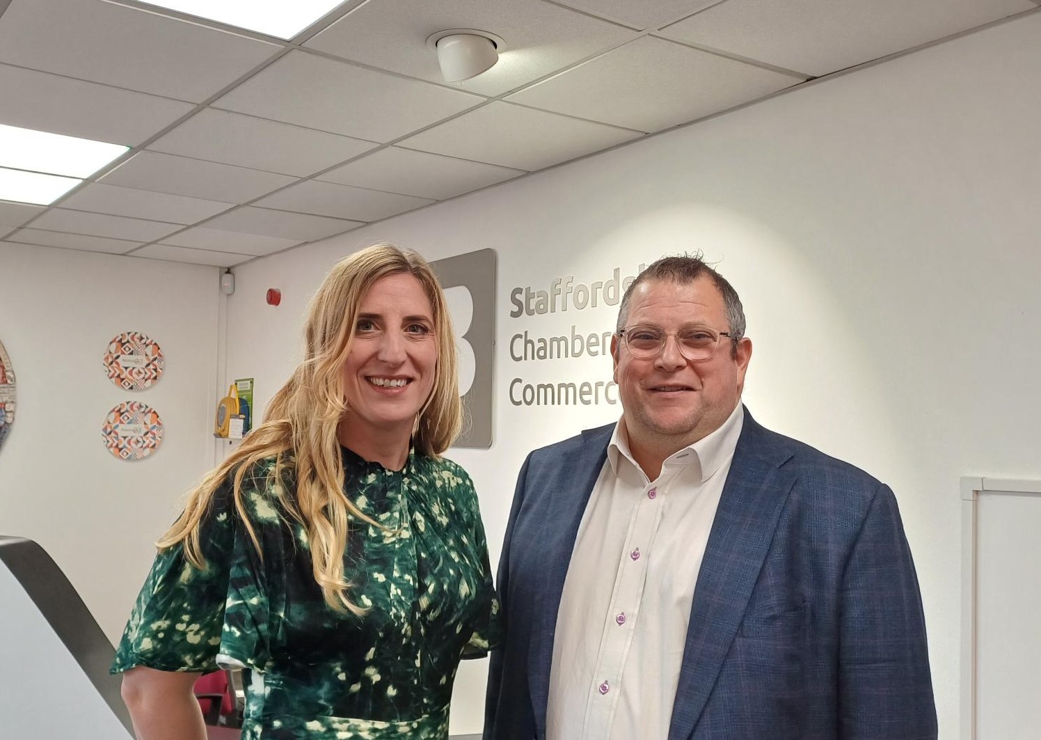 Dr Eve Davies and Steve Timmis stood in the Staffordshire Chambers reception area